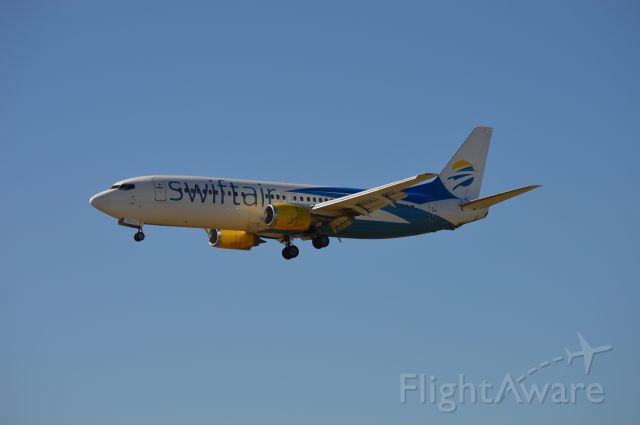 BOEING 737-400 (N440US) - SWQ9813 on short final for 20 arriving from Wendover (KENV/ENV).