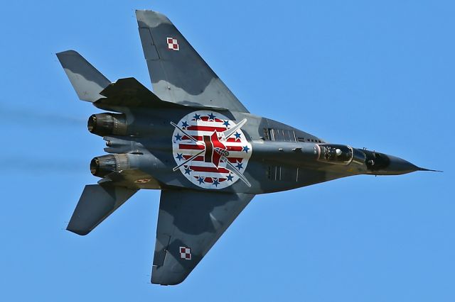 — — - Specially-painted MiG-29, Polish Air Force, banking hard right during its display at RIAT 2015, Fairford, UK.