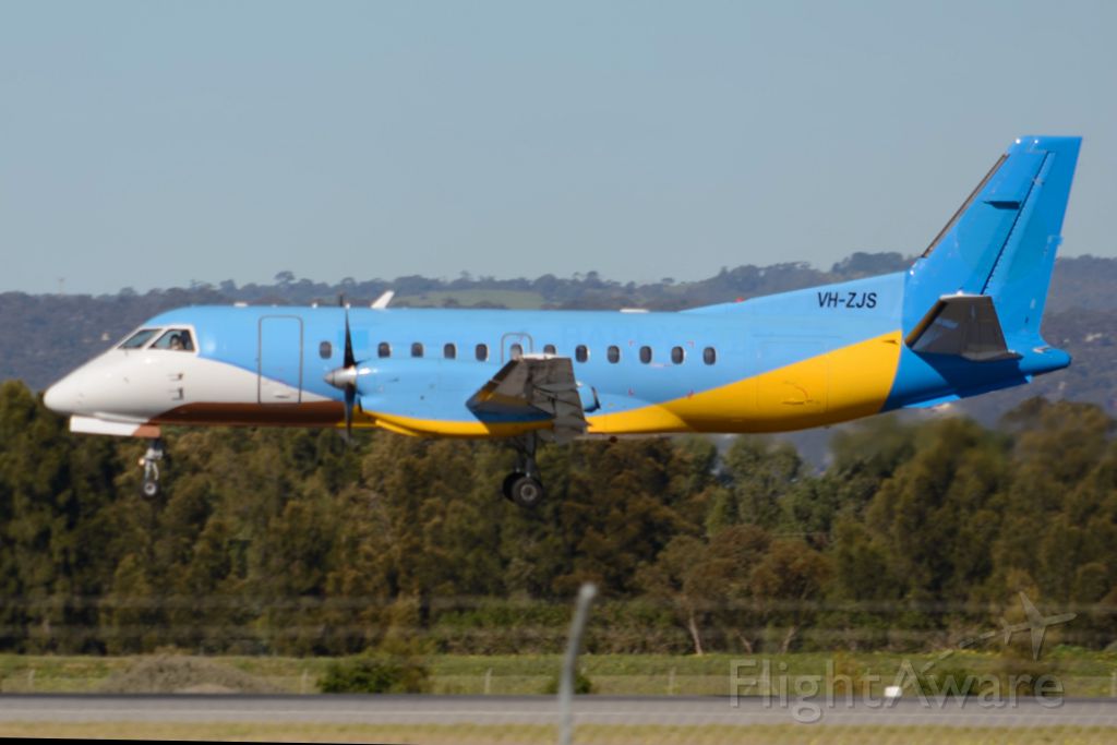 Saab 340 (VH-ZJS) - About to put down on runway 05. Tuesday 22nd July 2014.