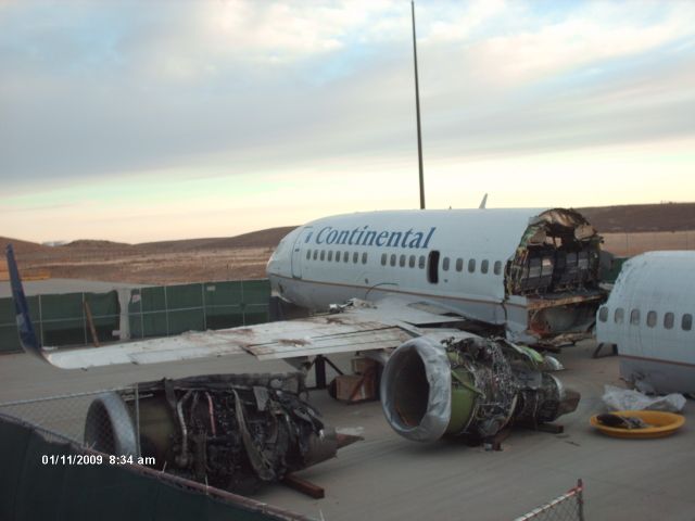 Boeing 737-700 (N18611) - The Continental flight that never left Denver. Flight 1404, they put the remains on the Continental hangar ramp for the investigation.