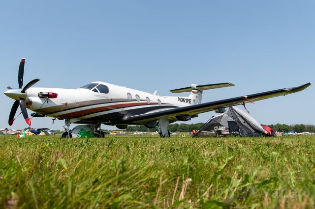 Pilatus PC-12 (N361PE) - Always love seeing the bigger turboprops slummin' it in the grass with the other smaller GA aircraft at Oshkosh. This is what aviation is all about!