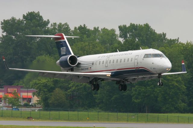 Canadair Regional Jet CRJ-200 (N403AW) - Passing by the Dunkin Donuts drive through