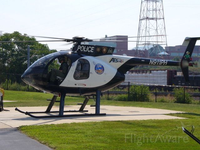 N911PH — - Air 1 refueling at MU05 Downtown St Louis, MO. Metro Air Support is St Louis County and St Louis Citys combined effort for air support Law Enforcement in both County and City Police Departments. They have six 500s in their fleet.