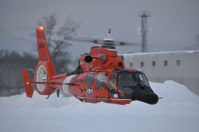 CG6588 — - newest helo to the tc fleet, 88 heads out after a snow storm
