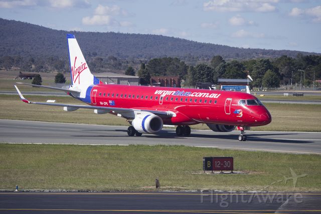Embraer ERJ-190 (VH-ZPK) - Virgin Australia, still in the Virgin Blue livery in March 2013, (VH-ZPK) Embraer ERJ-190AR taxiing to the terminal at Canberra Airport.