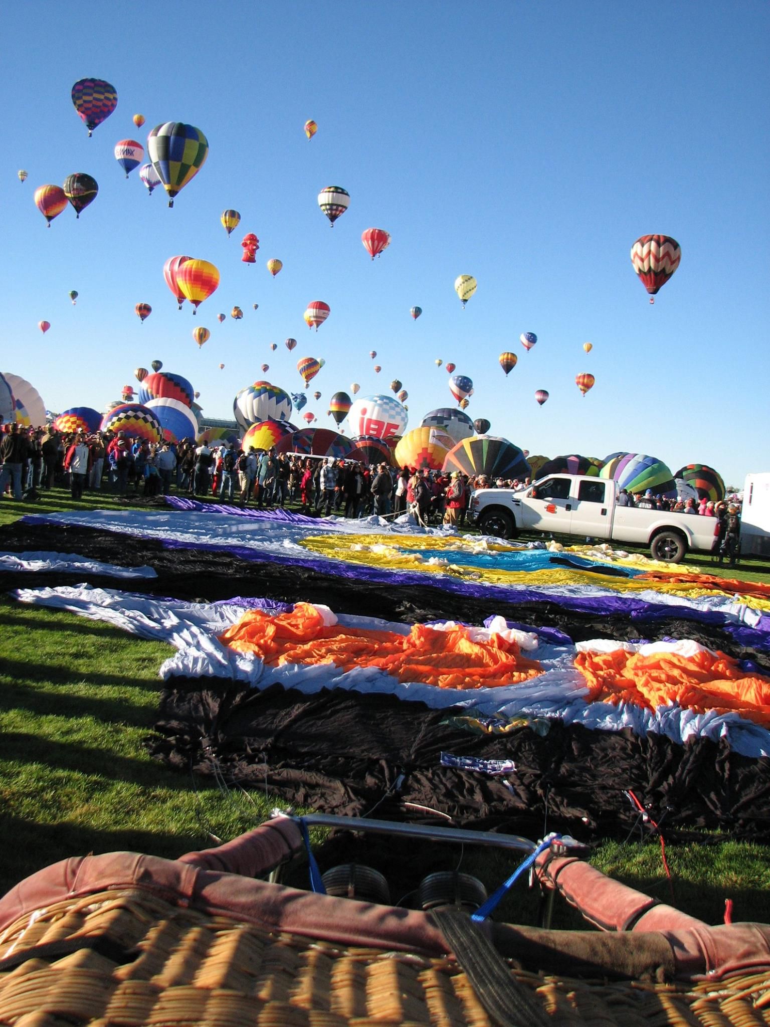 Unknown/Generic Balloon — - Brazilian Coruja owl balloon preparing to be inflated. 2014 Albuquerque International Balloon Fiesta. October 4, 2014.