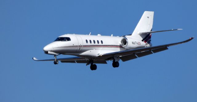 Cessna Citation Latitude (N674QS) - On final is this 2019 Cessna Citation Latitude 680A in the Winter of 2020.