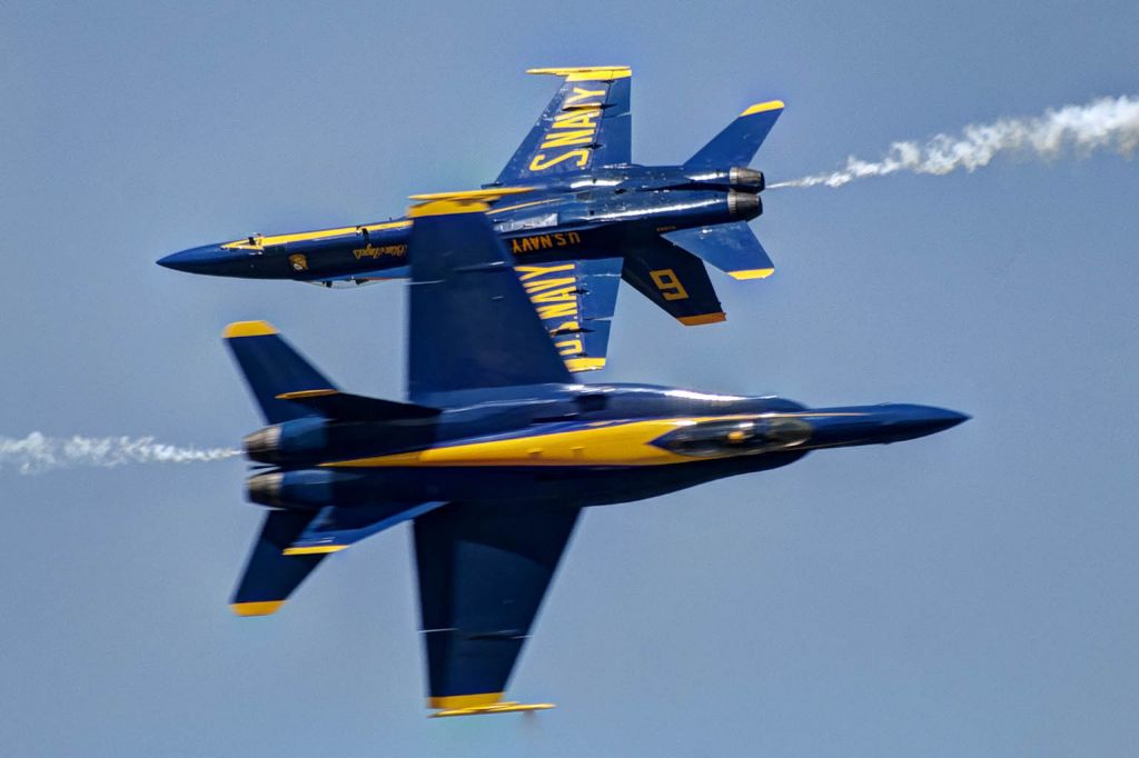 McDonnell Douglas FA-18 Hornet — - One shot, no motor drive used, one chance. Two U.S. Blue Angels F-18s perform an opposing pass maneuver at a Robins AFB Open House airshow