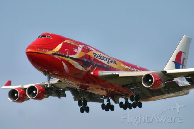 Boeing 747-400 (9M-MPD) - Special colours, landing at Heathrow in 2005.
