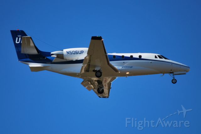 Cessna Citation Excel/XLS (N506UP) - TEXTRON FINANCIAL CORP (WHEELS UP) on final for runway 36R at KCLT - 11/7/14