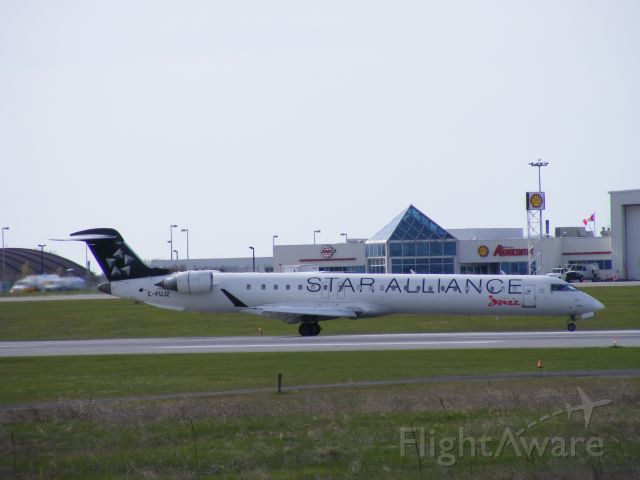 Canadair Regional Jet CRJ-200 (C-FUJZ) - star alliance crj Air Canada Jazz is a member.
