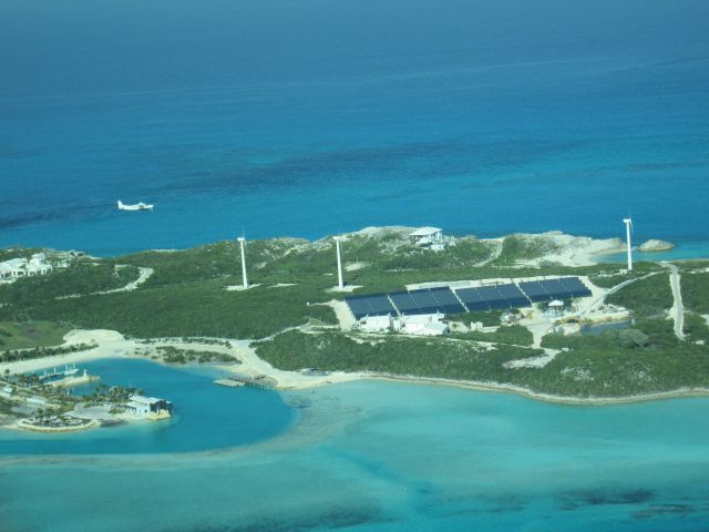 Cessna Caravan (WMA121) - Watermakers Air landing Staniel Cay. Flying over Overy Yonder Cay.