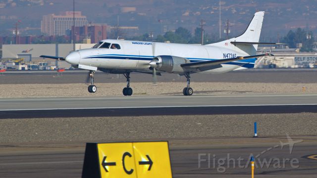 Fairchild Dornier SA-227DC Metro (N473AF) - Touching down on runway 16L at Reno Tahoe International.