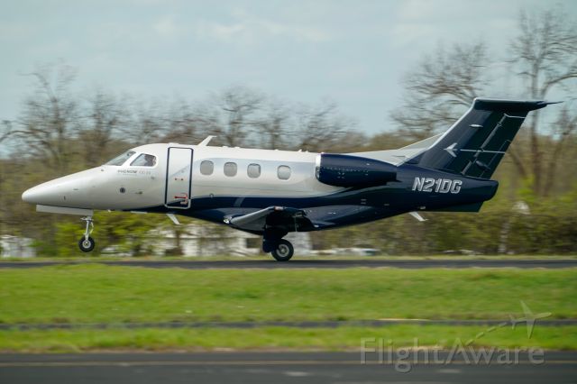 Embraer Phenom 100 (N21DG) - rotate