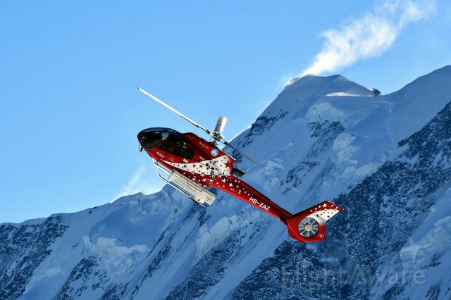 Eurocopter EC-130 (HB-ZAZ) - Air Zermatt - Eurocopter EC-130 T2 in front of the Liskamm mountain.br /I took this picture on the Gornergrat (3090 meters above sea level / 10138 ft).br /Photo taken on January 6, 2022 at 10°F.