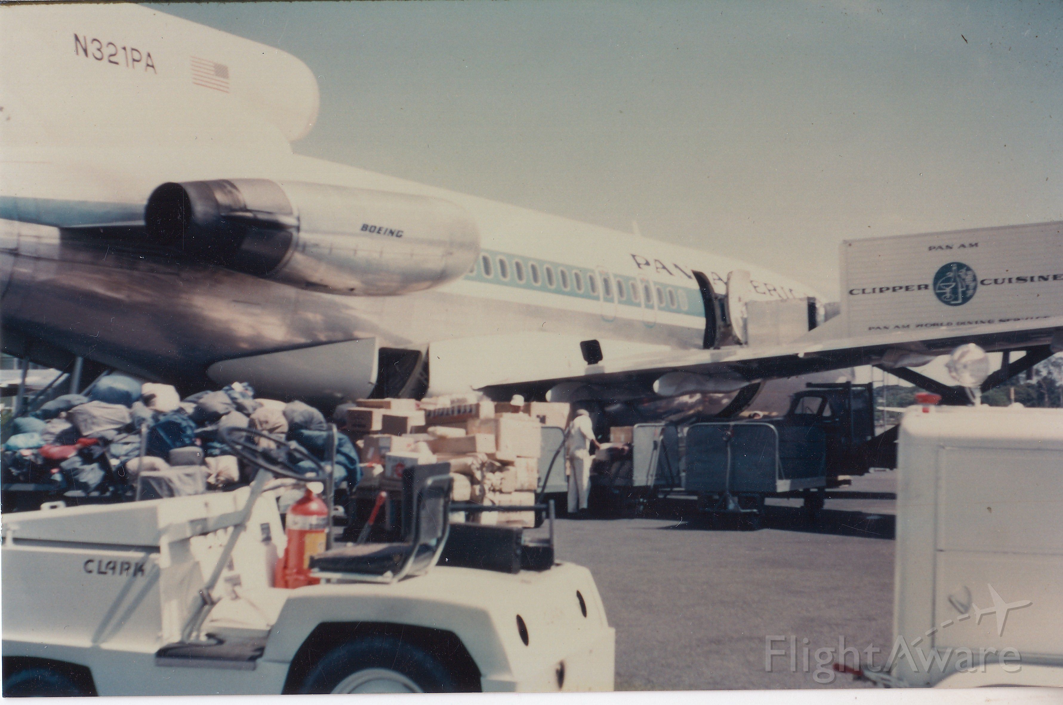 Boeing 727-100 (N321PA) - Loading 727  N321  Ilopango Airport El Salvador  1968   Note  We did not use any conveyor,  just manpower,   all bulk loading!!!!!