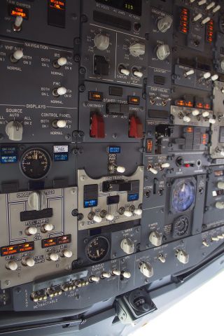 Boeing 737-800 — - The captains view of the overhead on a newer 737-800.  You can clearly see which switches get used the most.