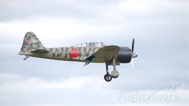 Mitsubishi A6M Zero (N3852) - Flying Heritage Collections Mitsubishi A6M3 ZERO on final approach to runway 16R for a touch/go landing on 6/6/12.
