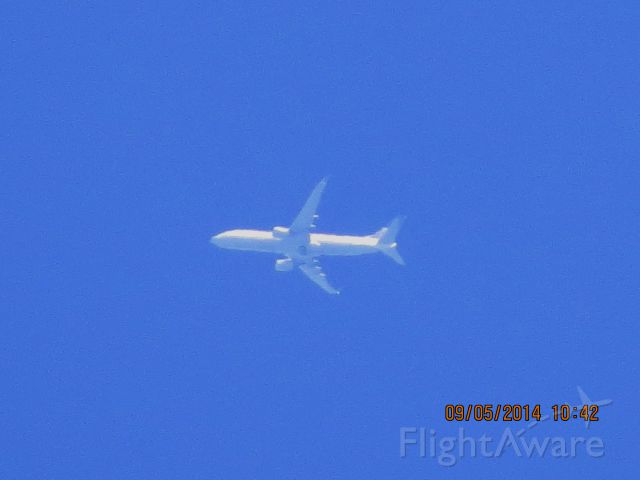 Boeing 737-800 (N14231) - United flight 1223 from EWR to LAX over Southeastern KS at 36k feet.