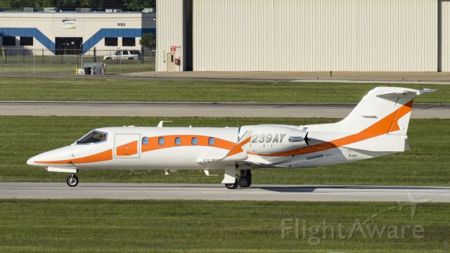 Learjet 31 (N239AY) - Taxiing to depart 13R