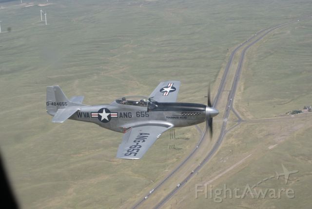 North American P-51 Mustang (N551CF) - In flight from KCPR to KFNL. Photo from B-17 "Nine-O-Nine" by David Eads