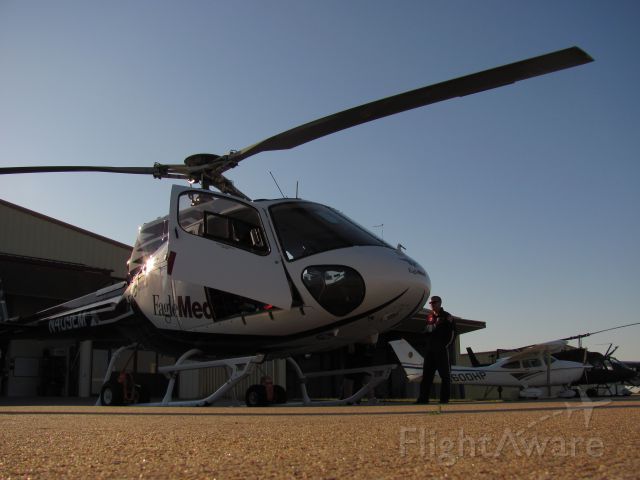 — — - Hays Medical Centers EagleMed helicopter parked and ready to  go during the Hays Fly In.