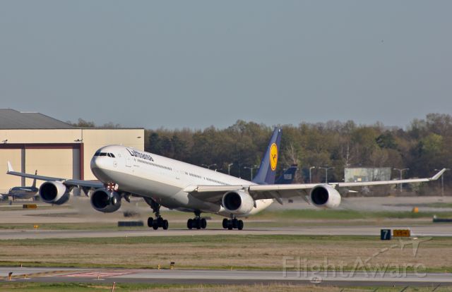 Airbus A340-600 (D-AIHT) - Lufthansa flight 429 rotates off runway 36C, beginning the 8 hour flight back to Munich Intl