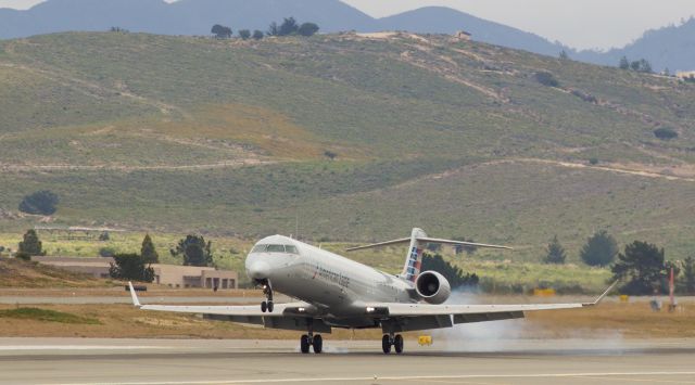 Canadair Regional Jet CRJ-900 (N241LR) - Arriving at Monterey Regional Airport shortly before high noon.