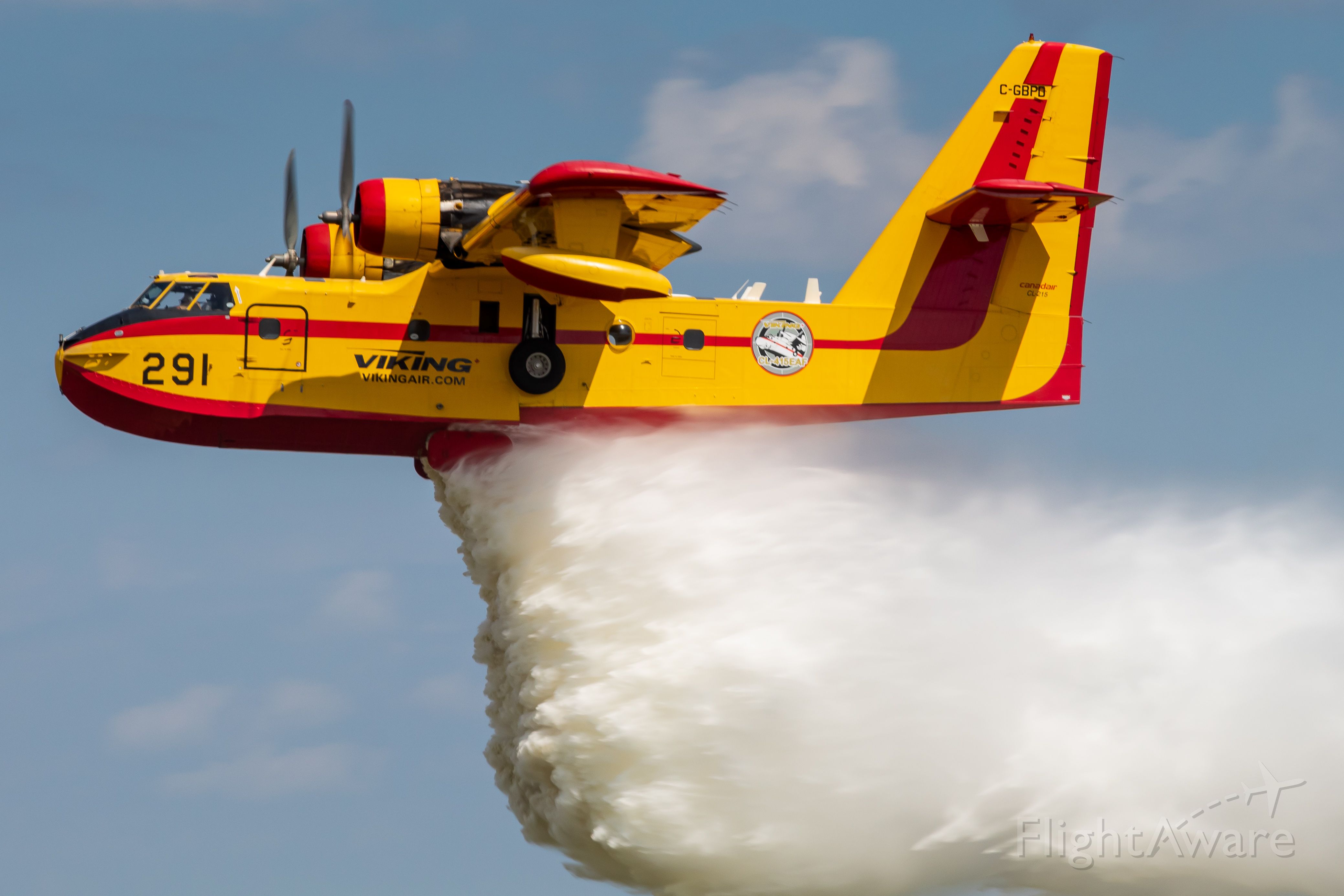 Canadair CL-215 (C-GBPD) - A Canadair CL-215 demonstrates its firefighting capabilities at EAA Airventure 2019.