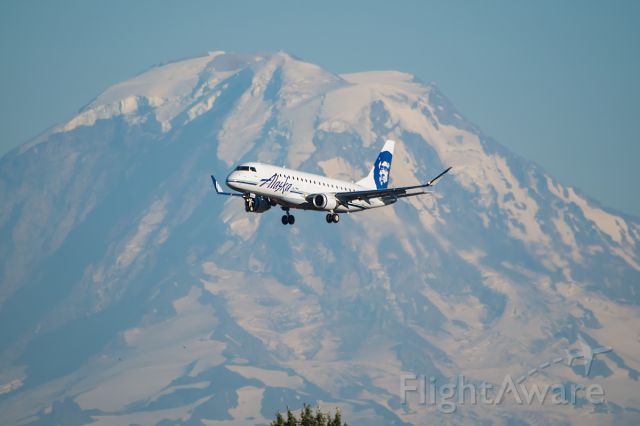 Embraer 170/175 (N171SY) - Skywest E175 opf Alaska Airlines, landing at SeaTac in July, with a fantastic shot of Mt. Rainier in the background. 