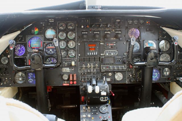 Learjet 24 (N888MC) - The cockpit of a classic Lear 24 parked at the TAC ramp on a fuel stop while on its way to a new owner.