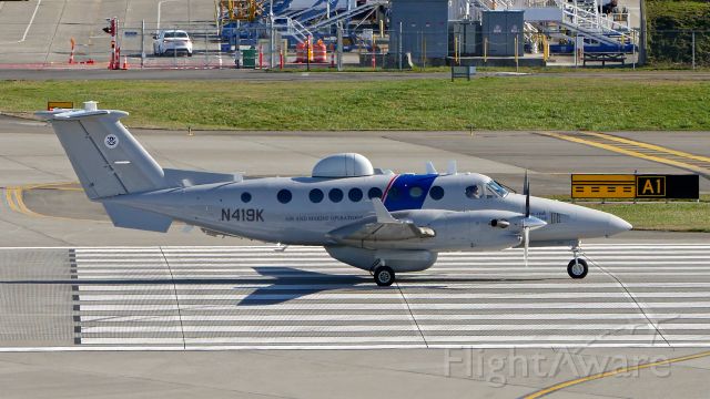 Beechcraft Super King Air 350 (N419K) - A Beech Super King Air B300C operated by the U.S. Dept of Homeland Security (Ser #FM-64) begins its takeoff roll on Rwy 16R on 2.18.20.