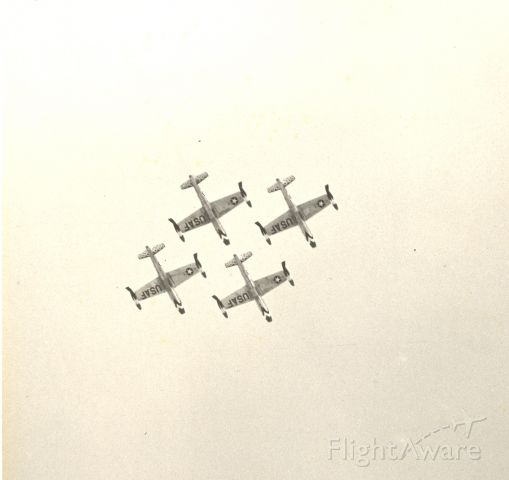 — — - USAF Thunderbirds formation at the 50th anniversary of flight. Kitty Hawk, N.C. 17 Dec. 1953