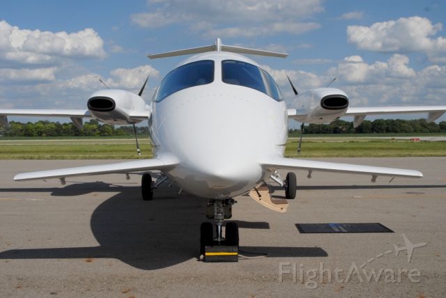 Piaggio P.180 Avanti (N176SL) - nose to nose with the flying catfish at Bolton