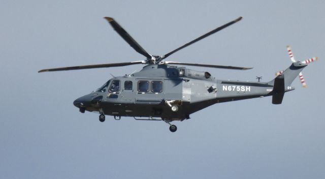 BELL-AGUSTA AB-139 (N675SH) - Making a low pass is this 2019 AgustaWestland MH-139A Grey Wolf Rotorcraft from the Autumn of 2020.