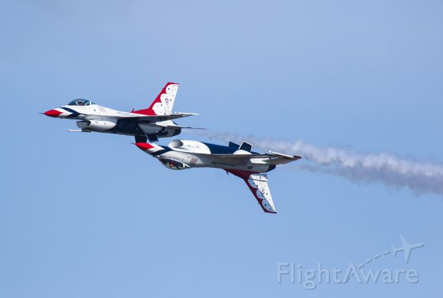 Lockheed F-16 Fighting Falcon — - US Air force Thunderbird #5 sliding up under #6. Just amazing how close they get and don't bump. Questions about this photo can be sent to Info@FlewShots.com