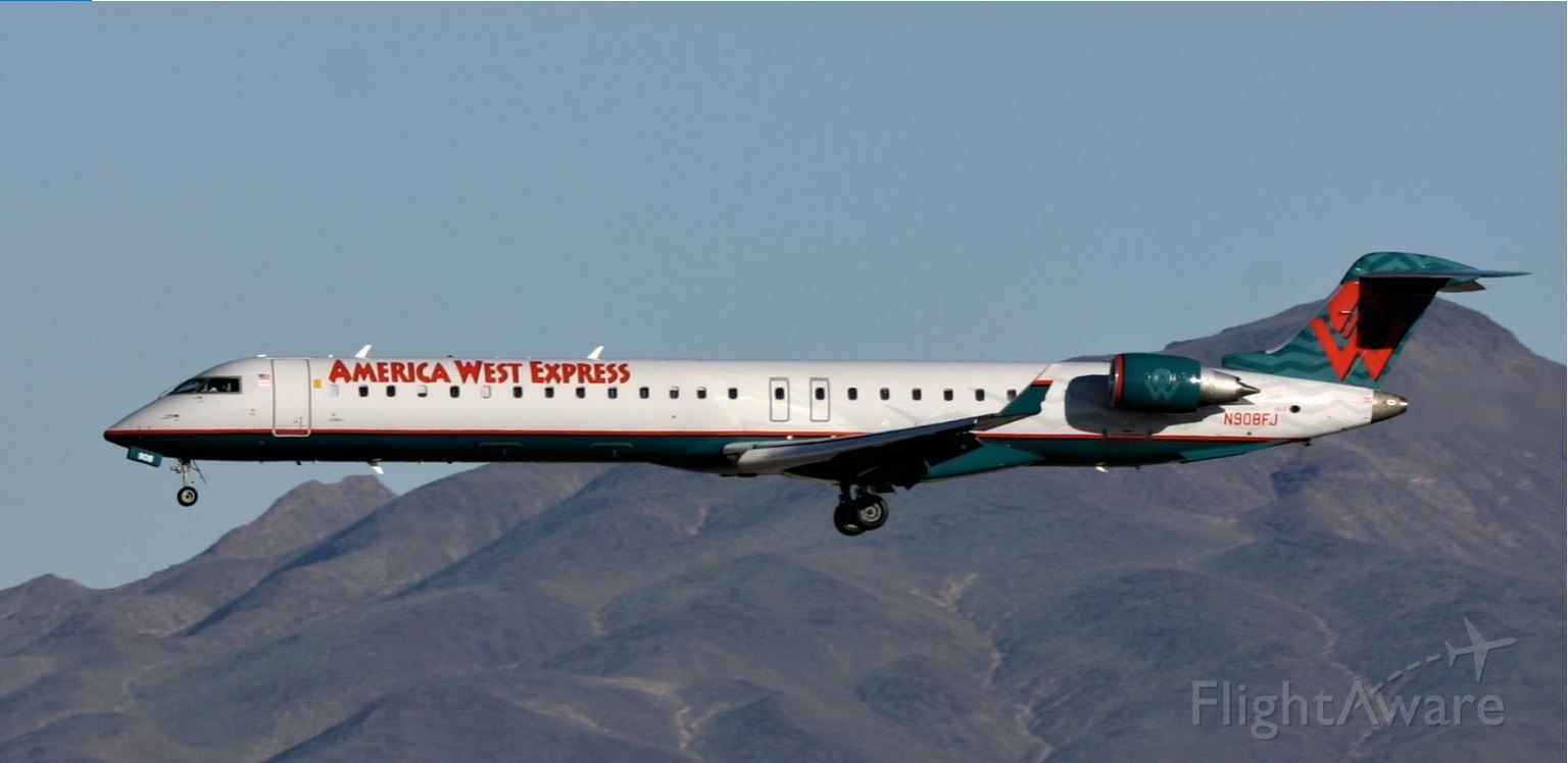 Canadair Regional Jet CRJ-900 (N908FJ) - KLAS - America West Express Airlines CRJ-900 landing 1R at Las Vegas April 1 2005.Delivered new to Mesa Airlines in October 2003.