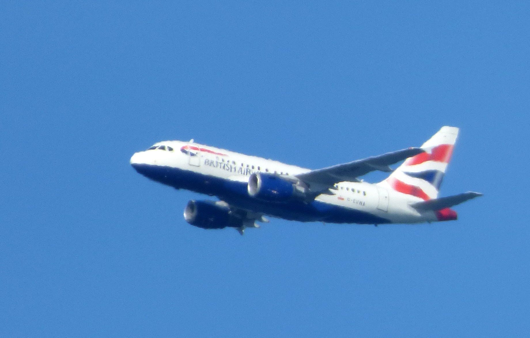 Airbus A318 (G-EUNA) - The smallest of the Airbus fleet this British Airways Airbus A318 is shown minutes away from crossing the North Atlantic with an arrival shortly into JFK in the Spring of 2017. Tough shooting with the air and water vapor and max zoom rendering this a bit blurry.
