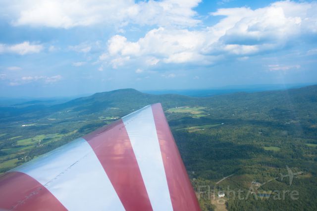 Piper Cherokee (N9916J) - Soaring over the mountains of Vermont.