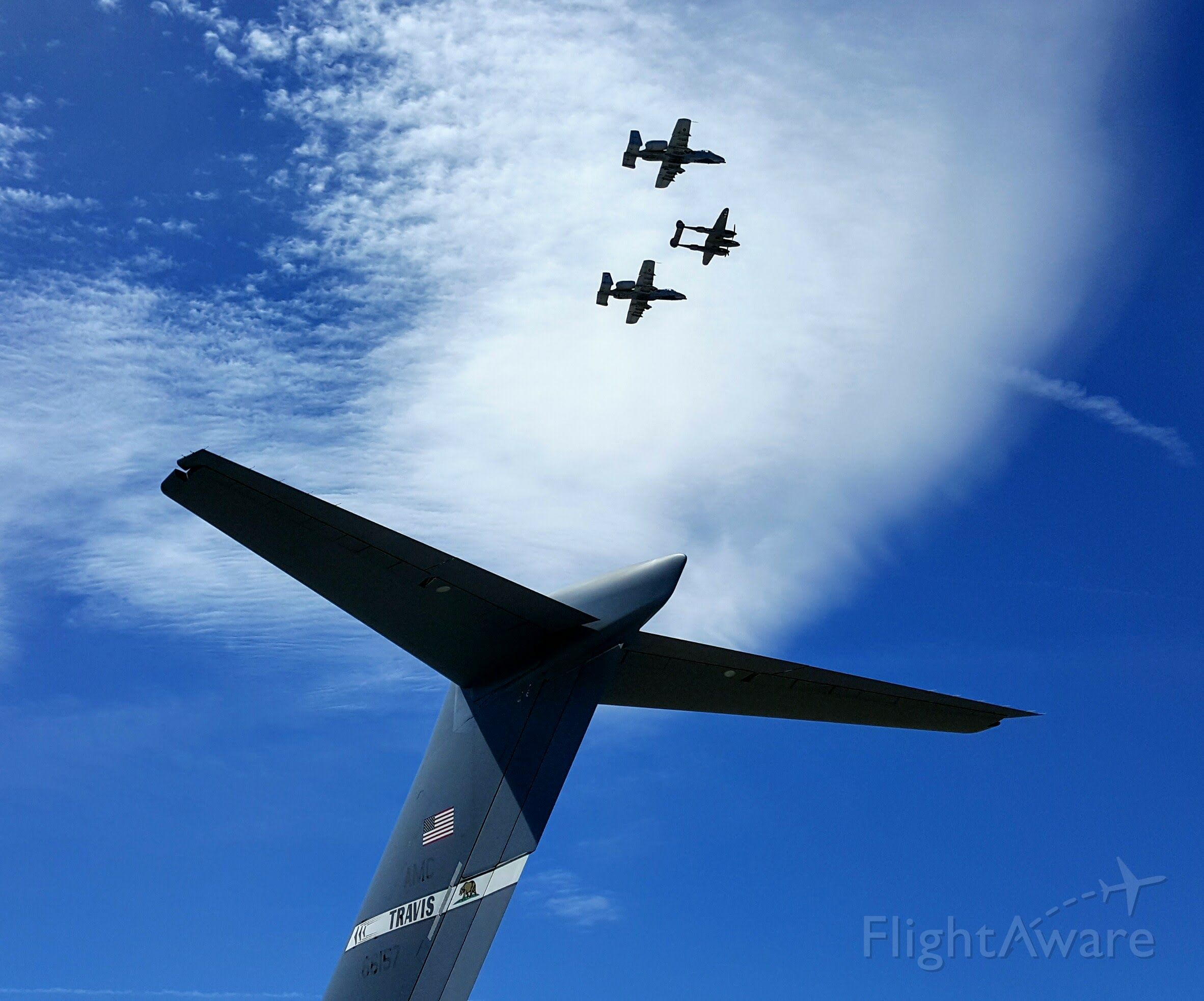 Cessna Skyhawk (N66157) - C-17 tail with two A-10s and a P-38 taken at 2017 LA County Airshow in Lancaster, CA