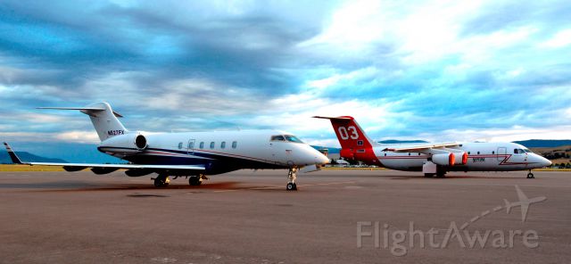 Bombardier Challenger 300 — - Flexjet CL300 and Neptune BAe-146-200A wildfire tanker.