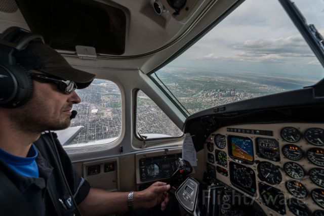 Beechcraft Super King Air 200 (C-FPNQ) - Captain turning on final coming into Calgary.   