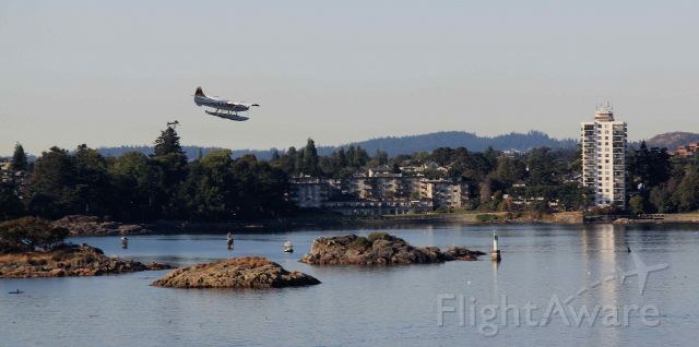 — — - Float plane coming into Vancouver BC