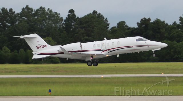 N31PF — - A Learjet 45 departing Jack Edwards National Airport, Gulf Shores, AL, via Runway 9 - June 29, 2017.