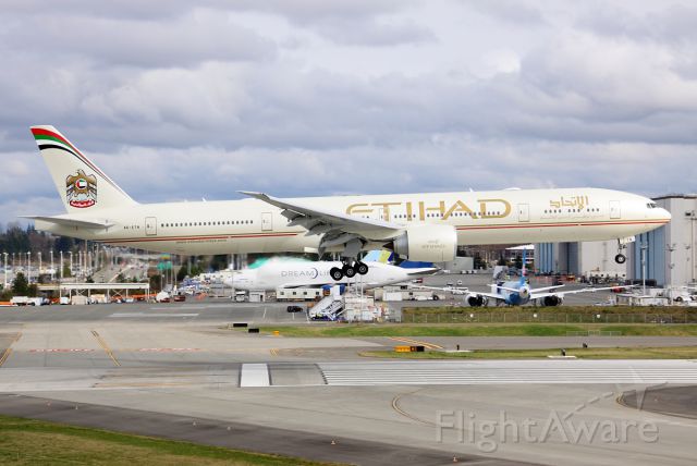 BOEING 777-300 (A6-ETN) - Etihad Airways A6-ETN landing at Paine Field March 15, 2013.