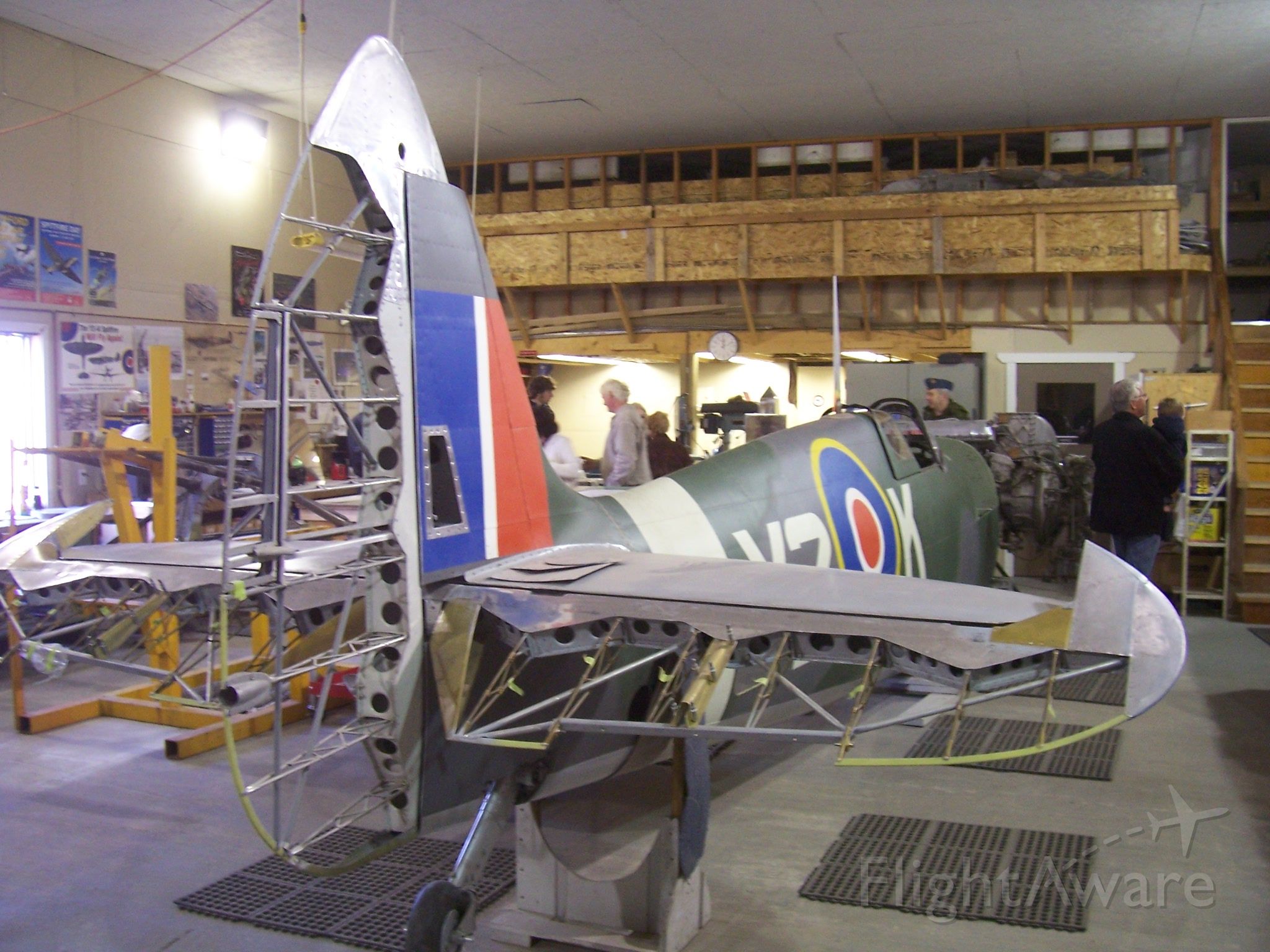 SUPERMARINE Spitfire (LIL294) - Y2K - Spitfire Restoration  CFB Comox 442 Sqn.  Supermarine Spitfire Mk IXc TE294    Between 1937 and 1948 5,665 Mark IX versions were produced  Total production of all models  22,742 - not to many left -  especially airworthy specimines  This one will fly again possibly as early as 2012    This air frame was originaly salvaged in south Africa  after service with the SA Airforce from 1947 to 1952    Wing span 36 ft. 10 in.  Fusalage Length 31 ft  12 ft. 8 in. in hight to the  tip of the 3 blade prop  Combat Weight 7,500 lbs