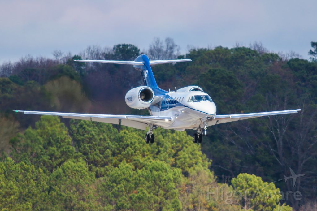 Cessna Citation X (N900UP) - This is a photo of N900UP, a 2000 Cessna 750 on final for Atlanta's PDK executive airport. I shot this with my Canon 800mm lens. The camera settings were 1/2000 shutter, F5.6 ISO 400. I really appreciate POSITIVE VOTES & POSITIVE COMMENTS. Please check out my other aircraft photography. Questions about this photo can be sent to Info@FlewShots.com