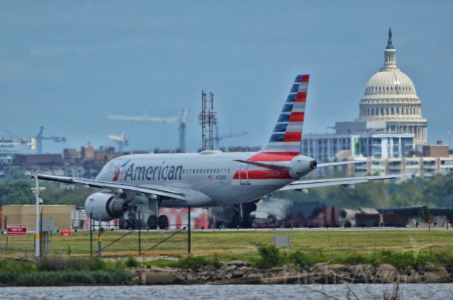 Airbus A319 (N722US) - A AirBus a319 operated by American waits for departure from Reagan Airport, headed out to Charlotte Douglas International Airport, 20190826. The US Capitol in the background.br /br /© 2019 Heath Flowersbr /br /Contact photographer for reproduction(s).