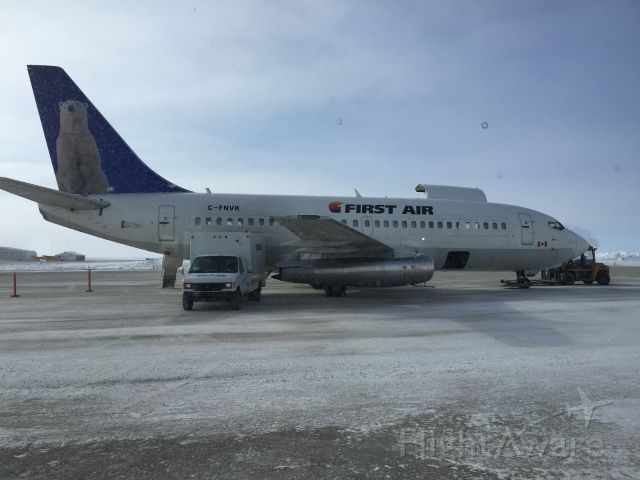 Boeing 737-200 (C-FNVK) - B737-200 north of the Arctic Circle. Notice the gravel skid on the nose wheel. Passenger capacity of just 34 people. Front 1/2 of the aircraft is cargo, thus the massive door on the fuselage. 