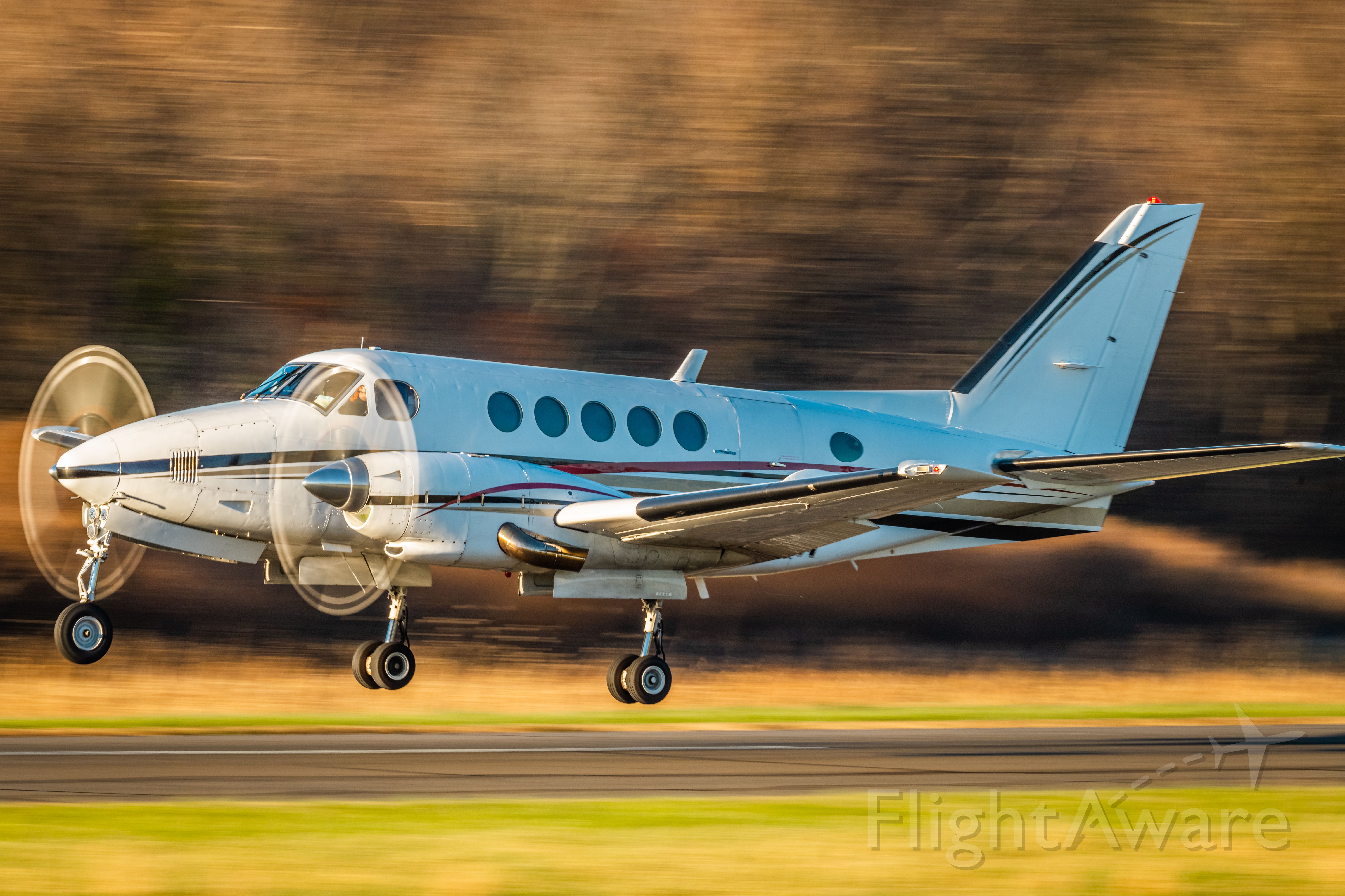 Beechcraft King Air 100 (N68DA) - Beechcraft King Air 100, N68DA taking off from KLOM during an autumn afternoon.